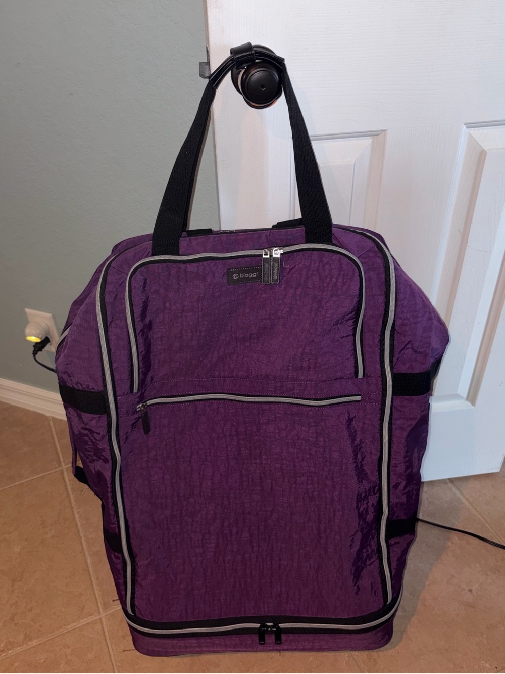 Biaggi ZipSak 31” foldable spinner  Duffle Bag Luggage in purple